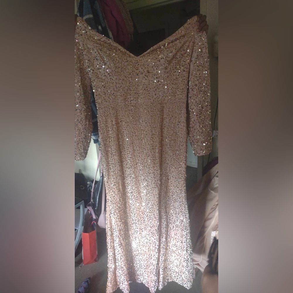 A sparkly sequin rose gold dress only wore once